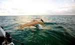 Diving from boat on vacation at Cape Eleuthera, The Bahamas